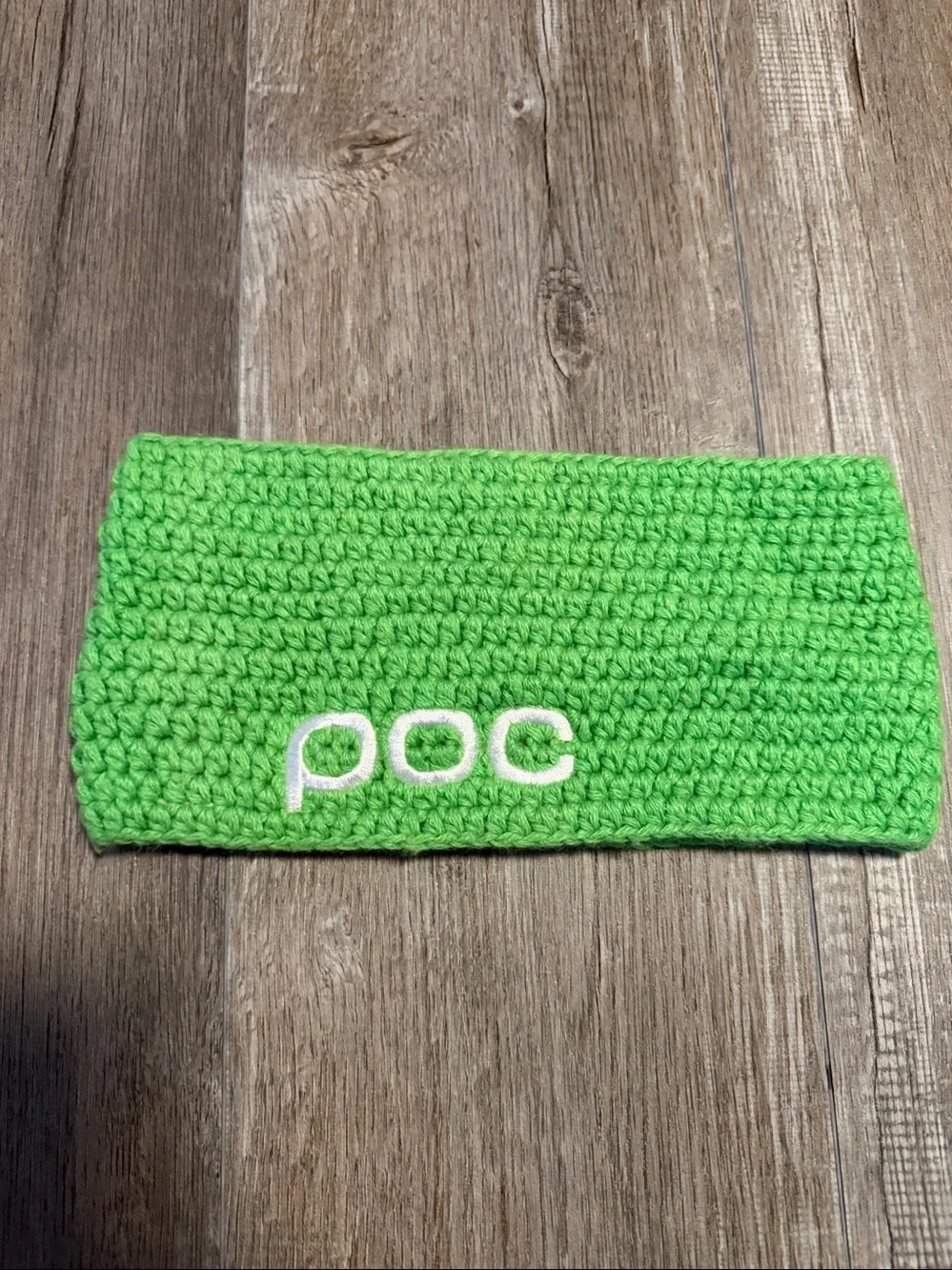 POC Crochet Headband featuring the distinctive white POC logo